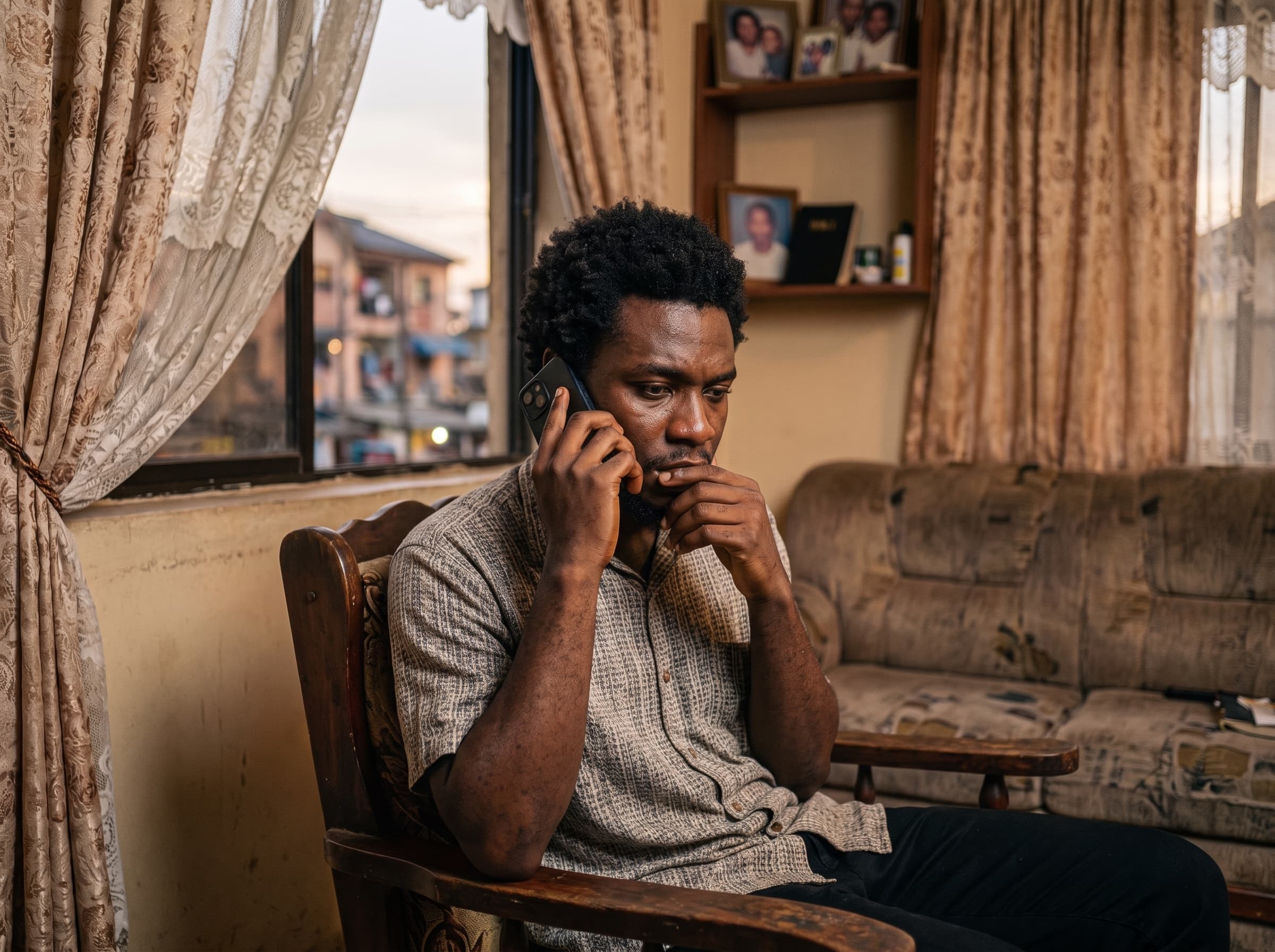 Man on phone looking worried
